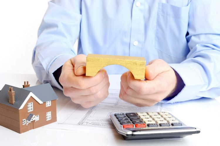 How does bridging finance help resolve short-term funding gaps?